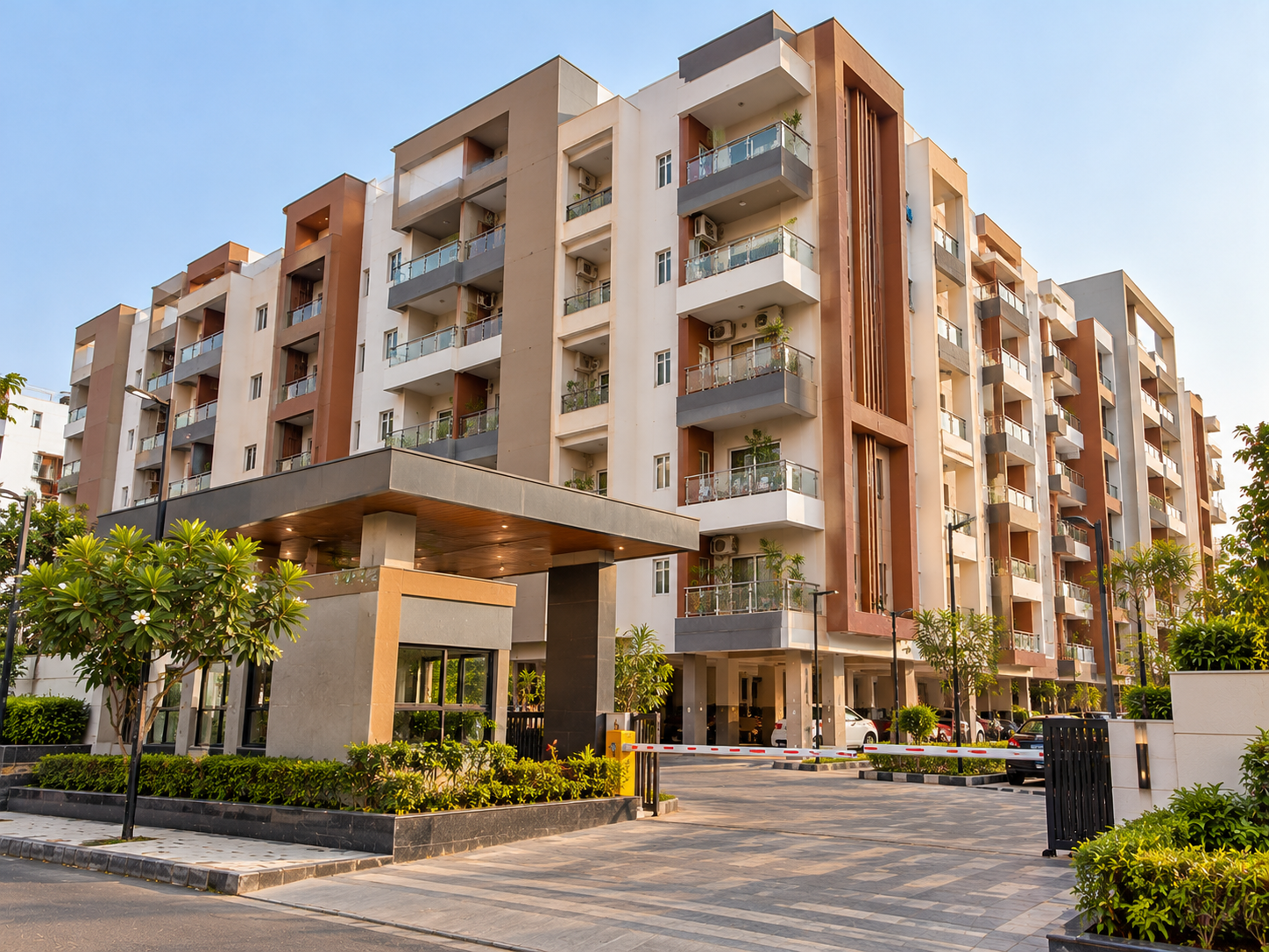 Modern apartment building with balconies and landscaped surroundings